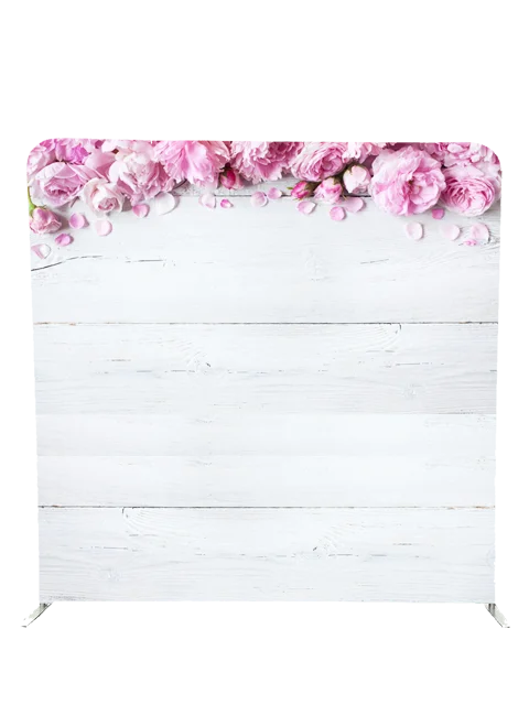 Elegant pink floral and white wood photo booth backdrop by Crown Booths, perfect for weddings and spring-themed events