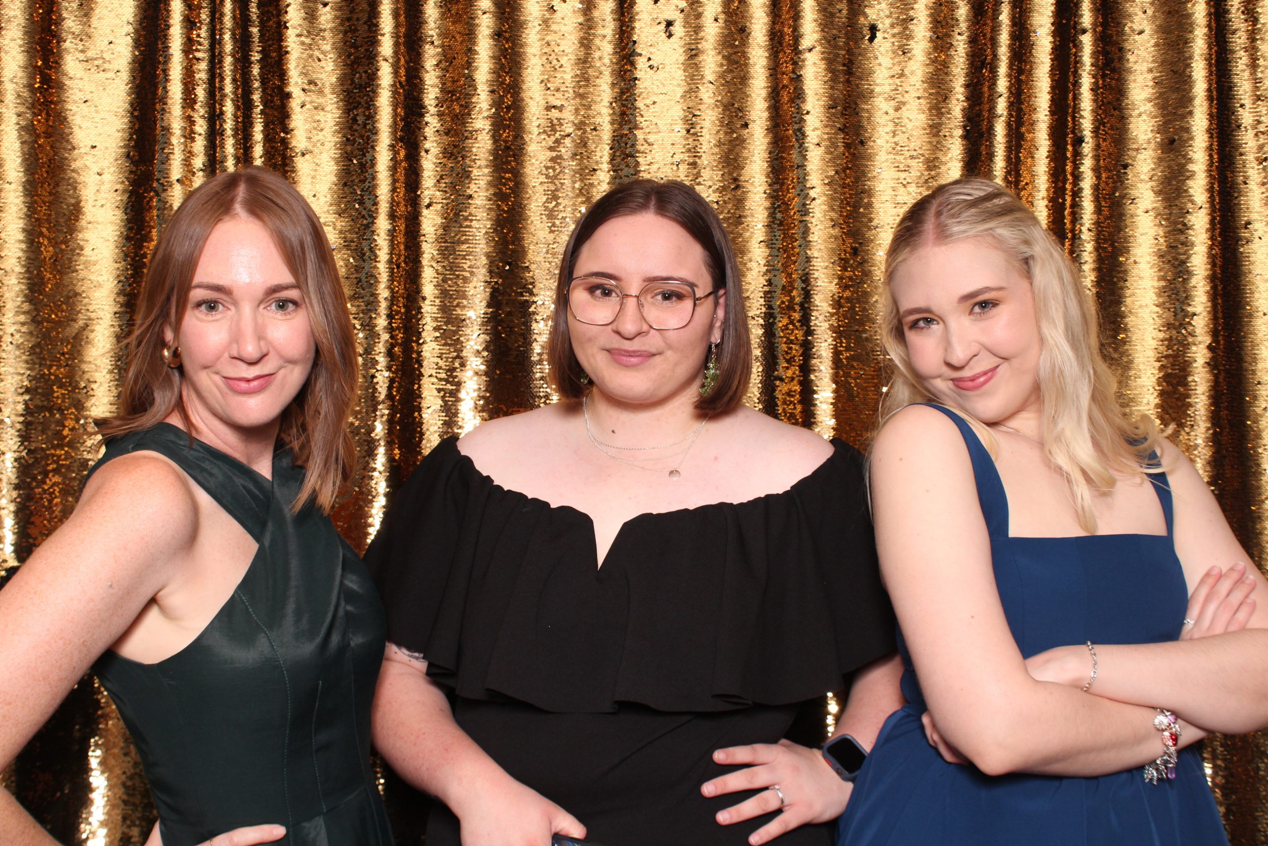 Luxurious gold sequin curtain photo booth backdrop by Crown Booths, perfect for glamorous and upscale events