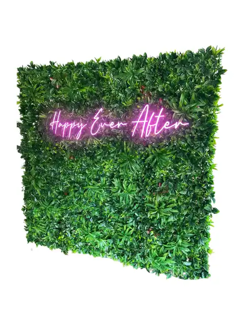 Lifelike green hedge photo booth backdrop by Crown Booths, perfect for weddings and romantic events